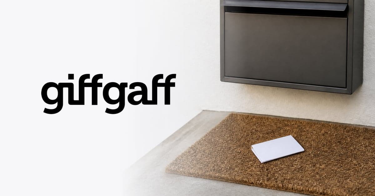 a single unopened SIM card envelope lying on a doormat beside a letterbox